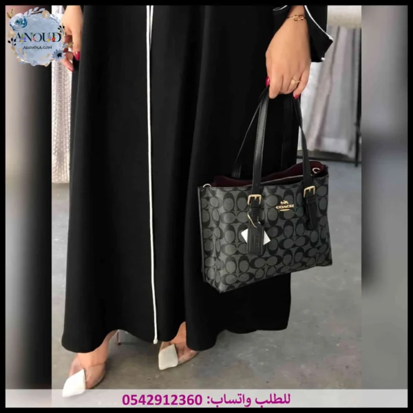 شنطة كوتش سوداء وسط