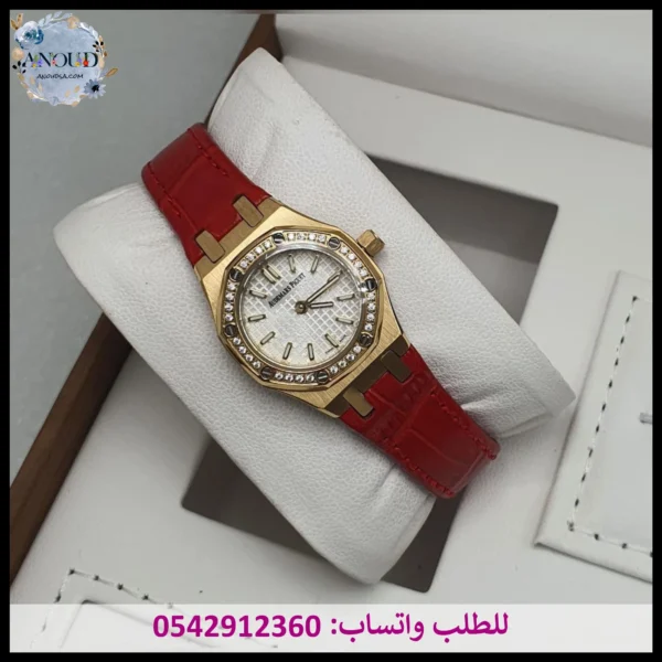 ساعة ادمر أحمر وذهبي